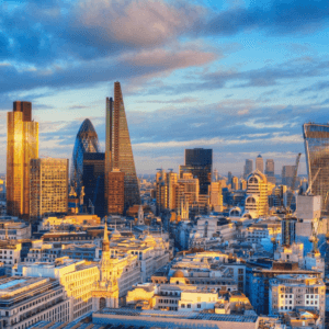 Aerial view of London city skyline at sunset.